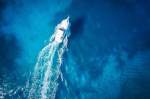 Overhead view of yacht in clear Caribbean water